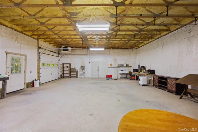 a view of a garage with furniture