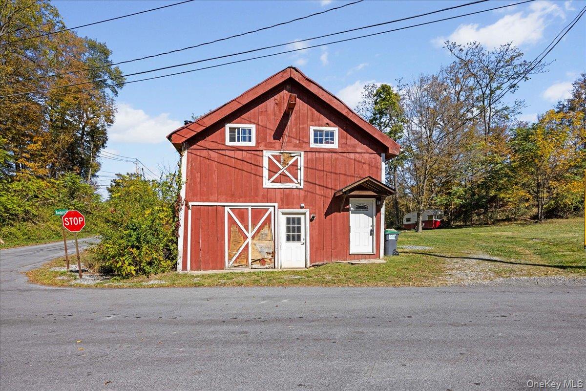 1-3 Amdurer Road Westtown, NY 10998 - Photo 2 of 48 a view of a house with a yard and garage