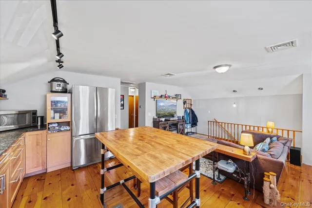 a bedroom with bed and window