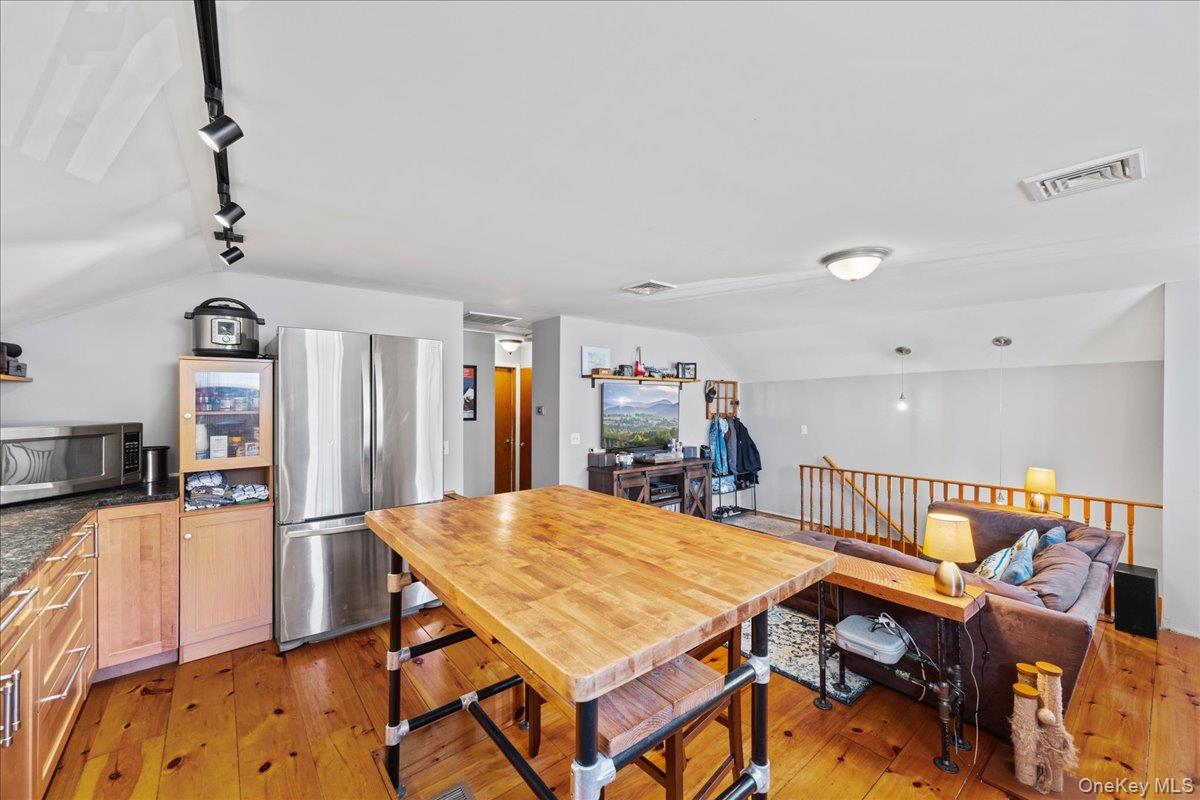 1-3 Amdurer Road Westtown, NY 10998 - Photo 28 of 48 a living room with stainless steel appliances kitchen island granite countertop furniture and a kitchen view