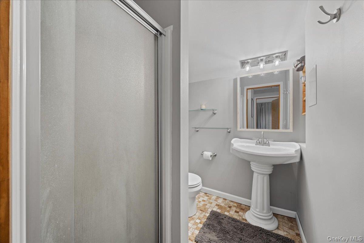 1-3 Amdurer Road Westtown, NY 10998 - Photo 33 of 48 a bathroom with a sink and a mirror