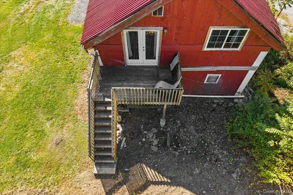 a view of a house with a big yard