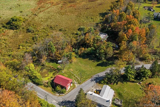 an aerial view of residential house with outdoor space