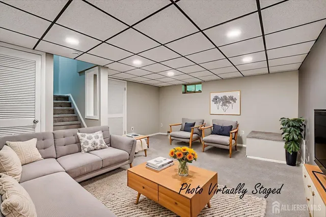 a view of a livingroom and a bathroom