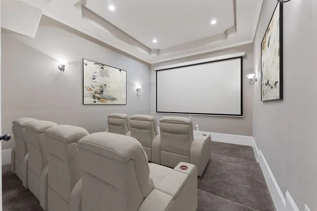 a living room with furniture a projector and a projector