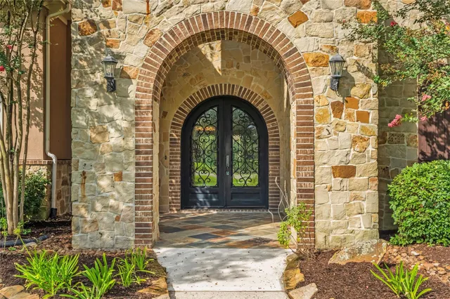 a stone house with a outdoor space