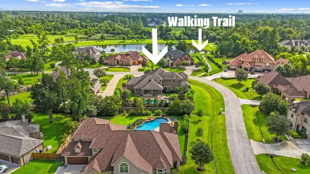 a view of swimming pool with a patio