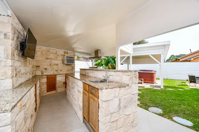 a view of a porch with garden
