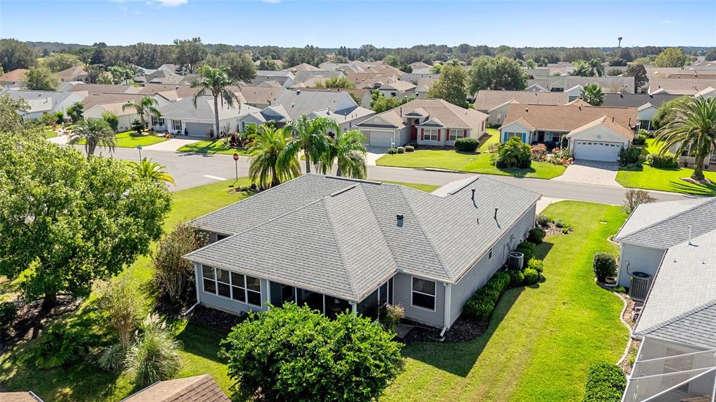 3073 Riverdale Road The Villages, FL 32162 - Photo 33 of 38 an aerial view of a house with a swimming pool