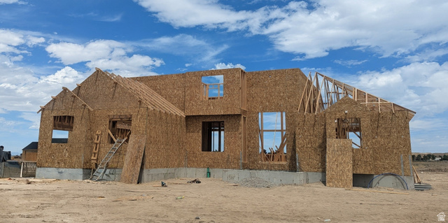 965 East Shilow Road, Unit 112 Tooele, UT 84074 - Photo 1 of 2 New construction framing with multiple roofline pitches