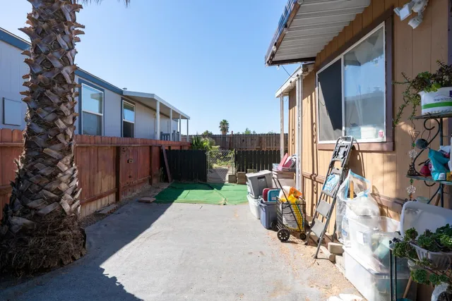 a view of backyard with cabin