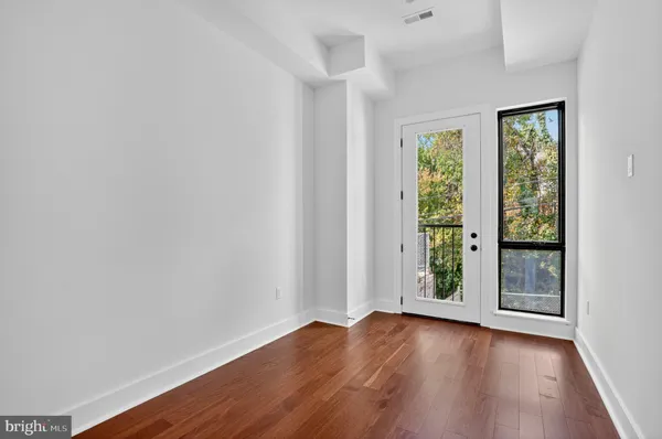 a bathroom with a sink toilet a mirror and shower