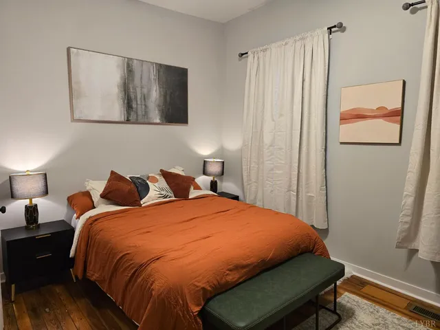 a bathroom with a sink toilet and mirror