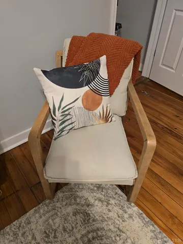 a view of a storage & utility room with a fireplace