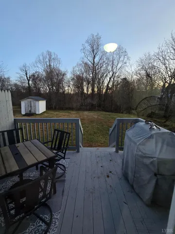 a bed room with a bed and a chandelier