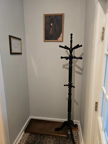 a bed room with a bed and a night stand