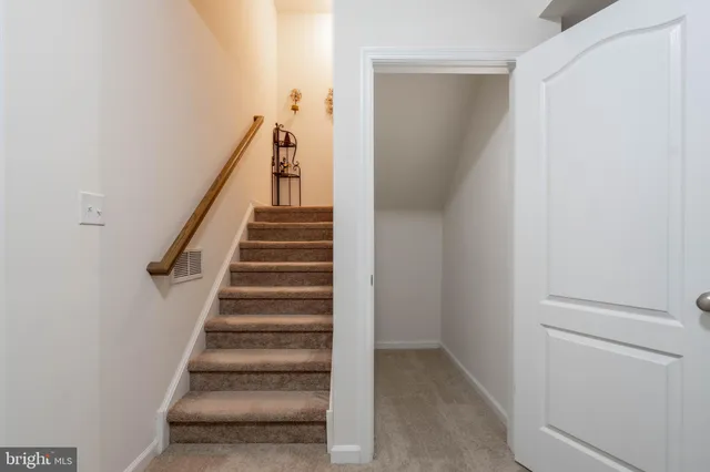 a room with furniture and a flat screen tv
