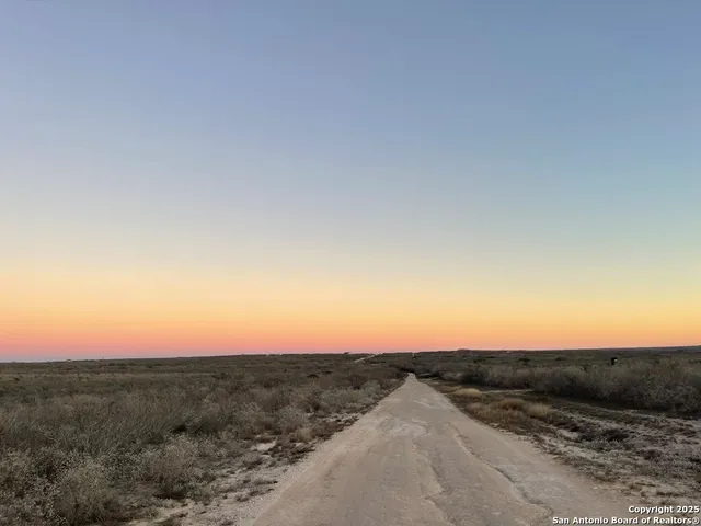 a view of yard with an outdoor space