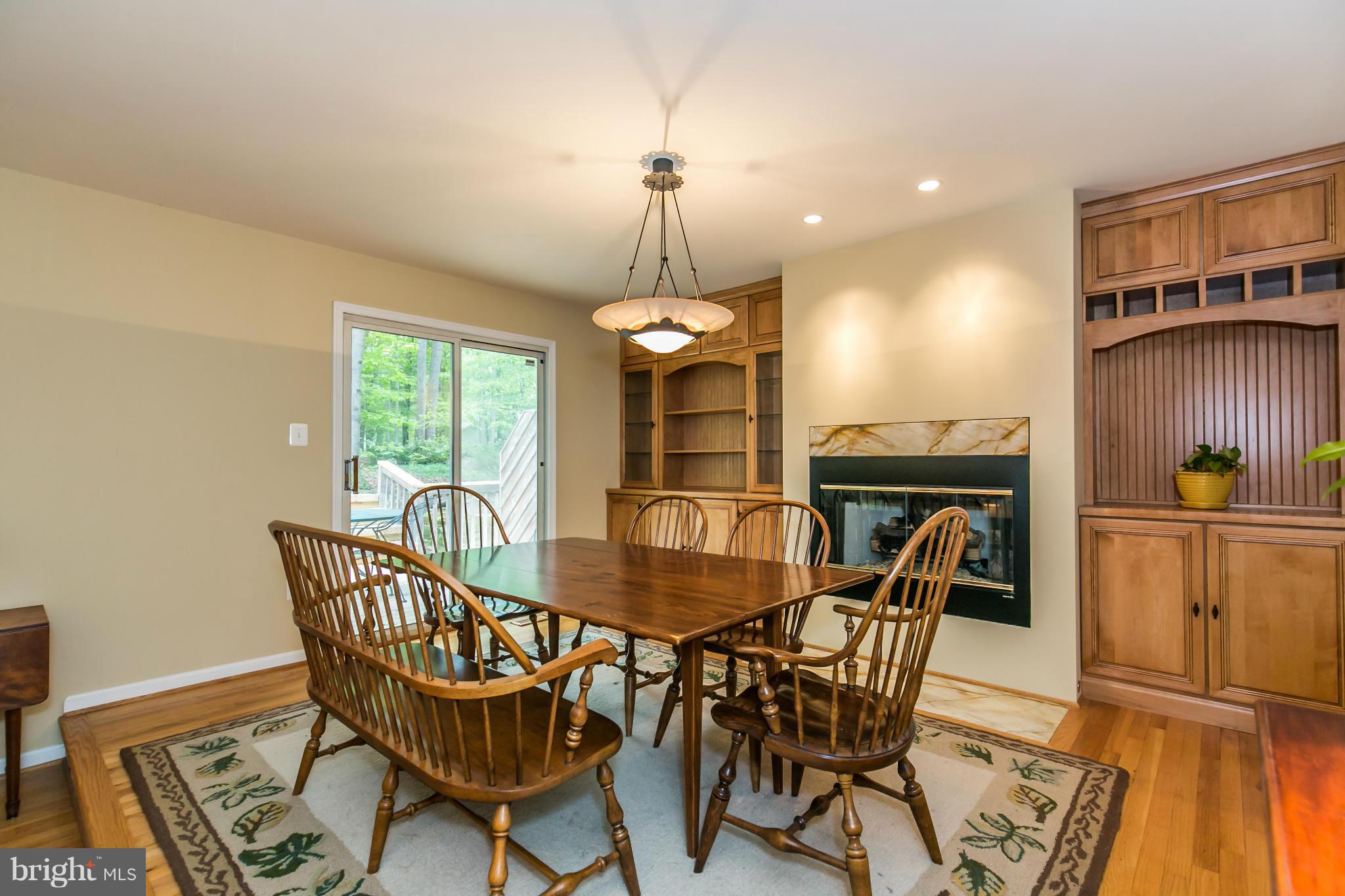 10722 Midsummer Drive Reston, VA 20191 - Photo 10 of 27 The dining room also leads to the back deck.