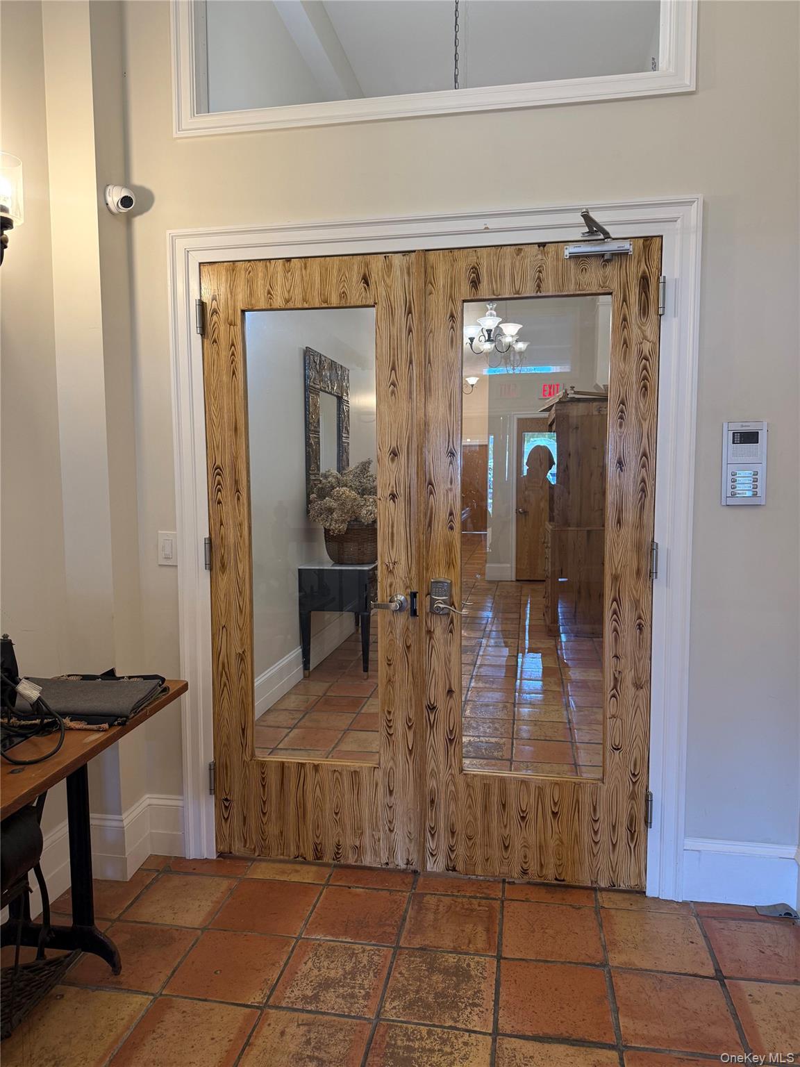 125 Main Street, Unit 2A Ossining, NY 10562 - Photo 3 of 23 a view of a hallway and a livingroom with furniture