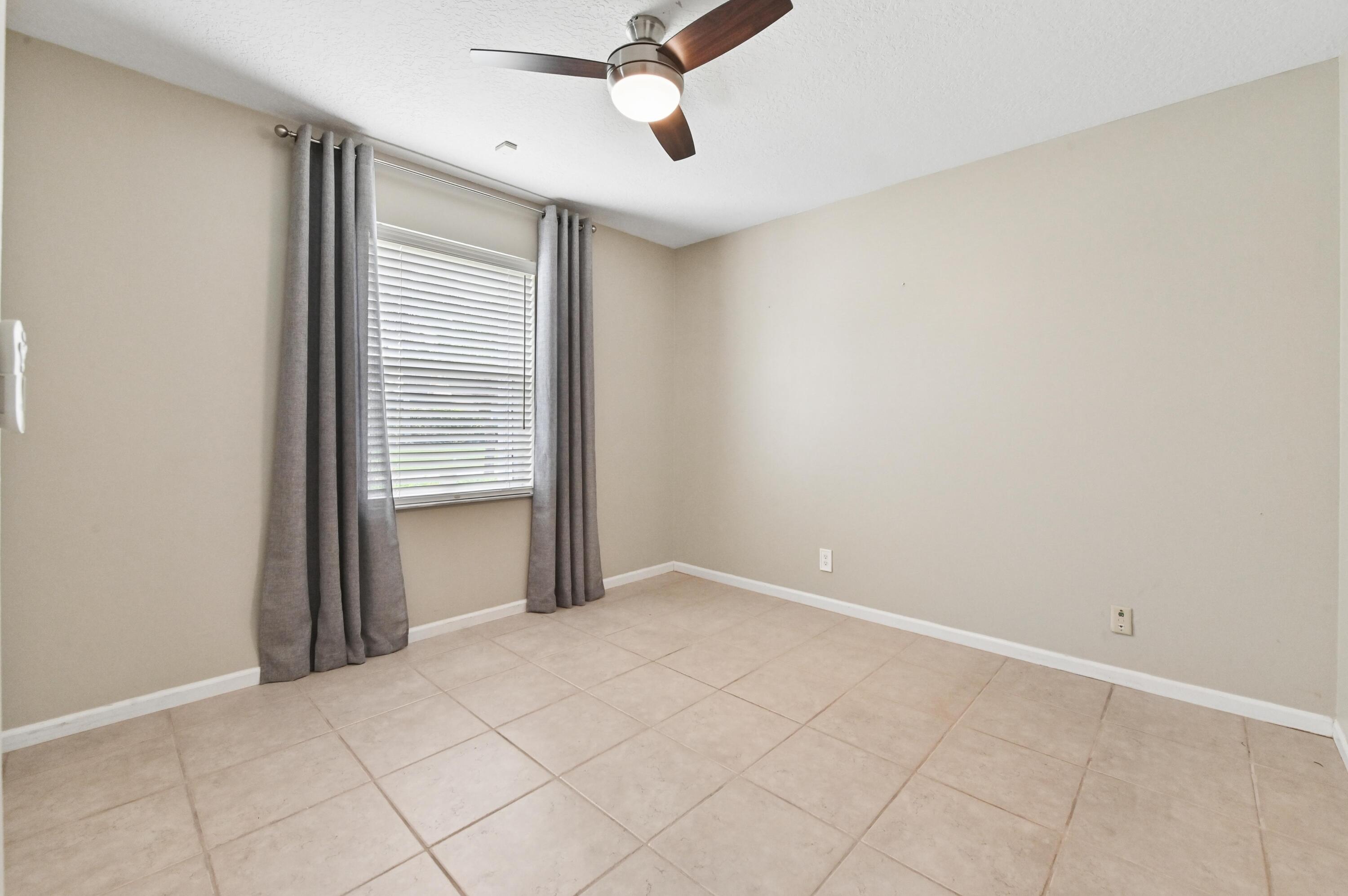 1163 Peninsula Way Greenacres, FL 33413 - Photo 22 of 40 19 Bedroom 01