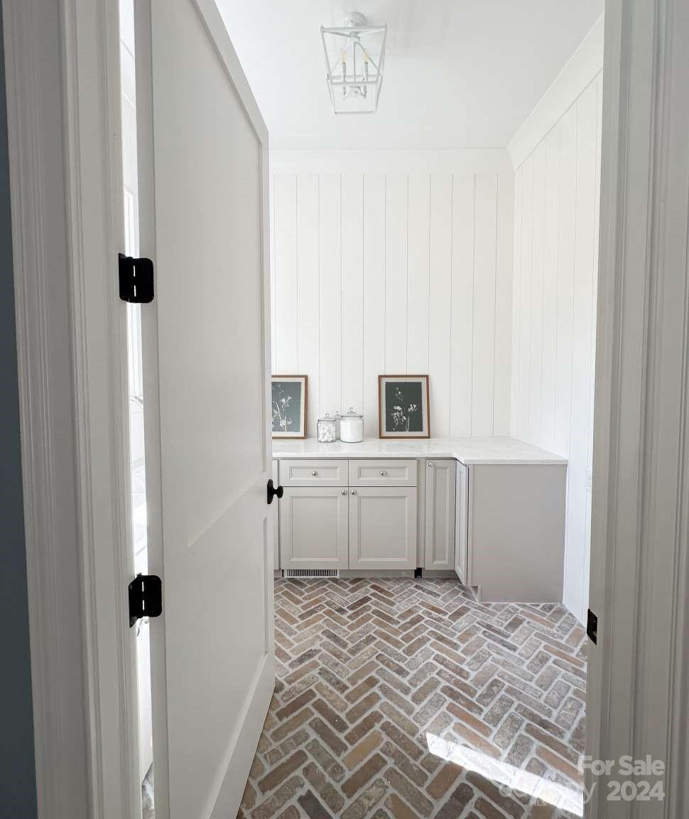 8316 Rolling Fields Road Charlotte, NC 28227 - Photo 13 of 35 a room with a bed and cabinets