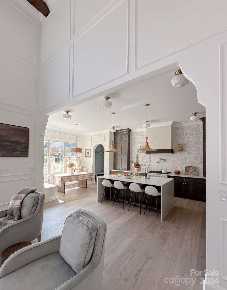 8316 Rolling Fields Road Charlotte, NC 28227 - Photo 15 of 35 a living room with lots of furniture and view of kitchen