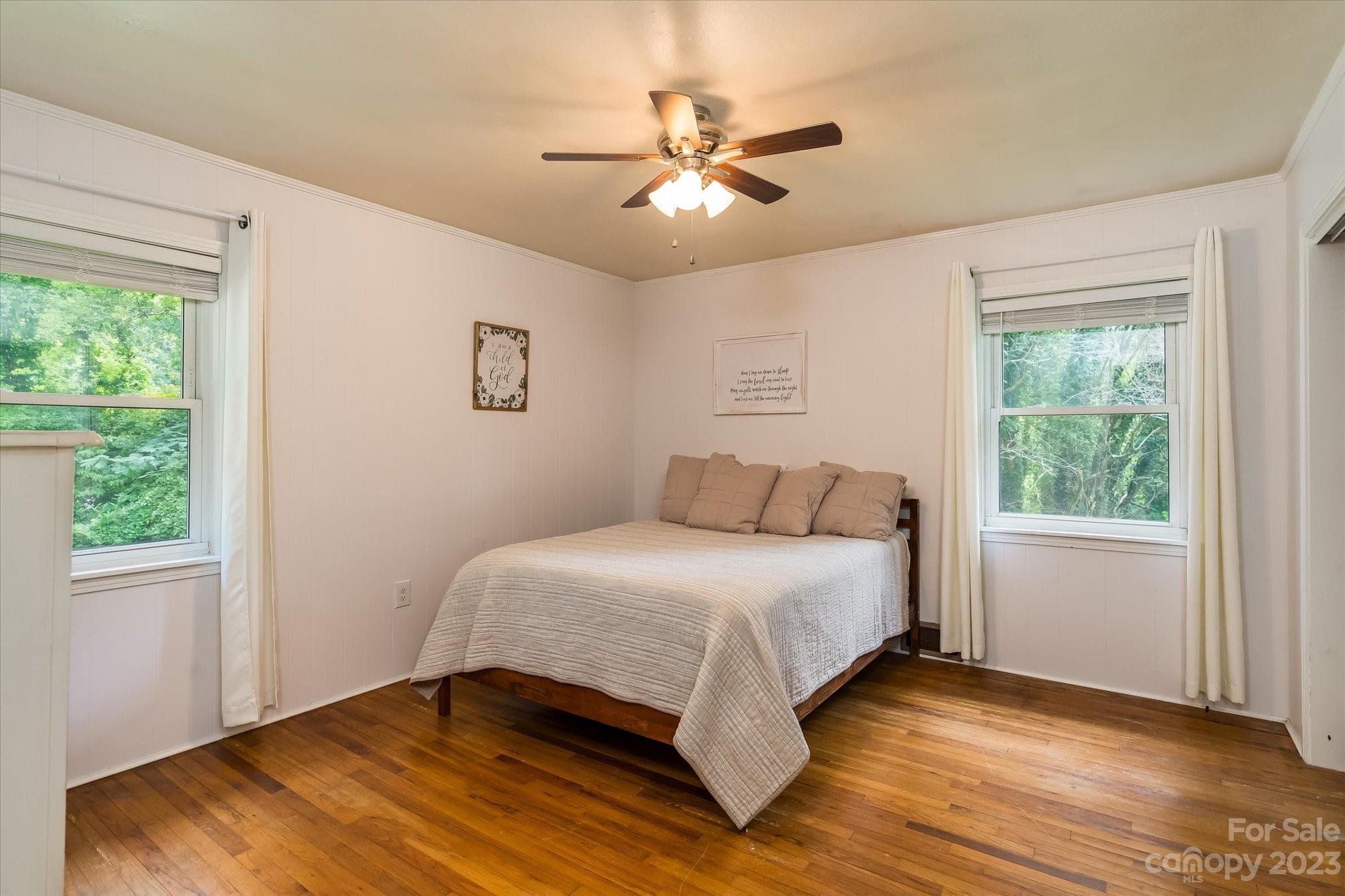 64 Vineyard Road Tryon, NC 28782 - Photo 36 of 45 a bedroom with a bed and a window