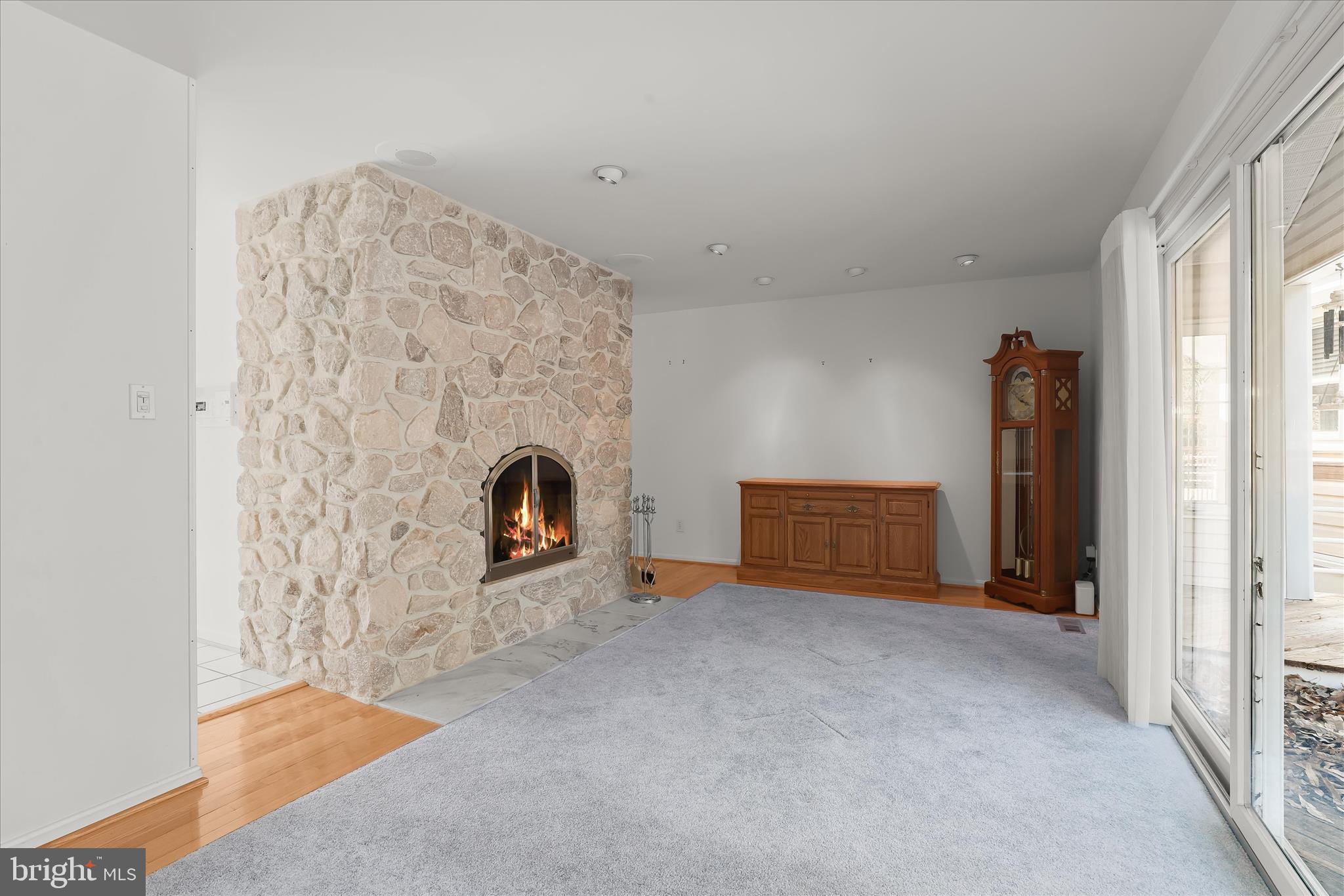 13612 Jacobs Road Mount Airy, MD 21771 - Photo 12 of 90 a view of a livingroom with an empty space and a fireplace