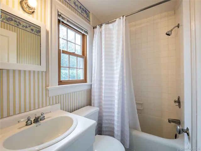 a bathroom with a sink and a bathtub