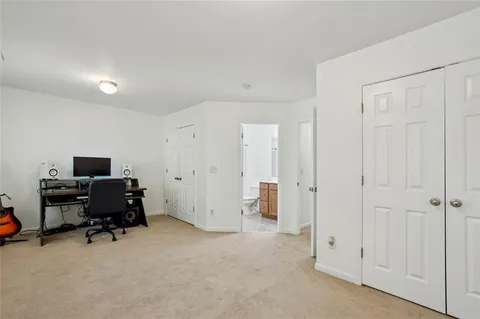 a view of a workspace with furniture and a livingroom