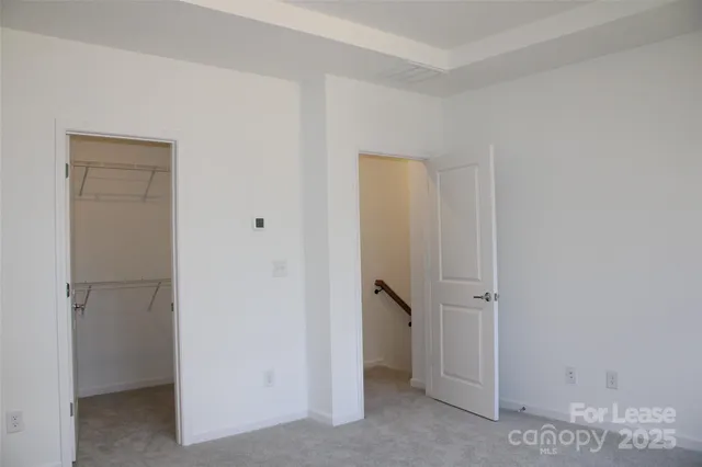 a view of walk in closet with window