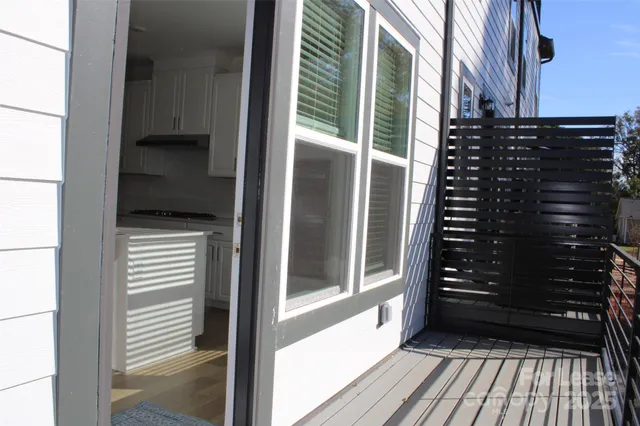 a view of a balcony with a door