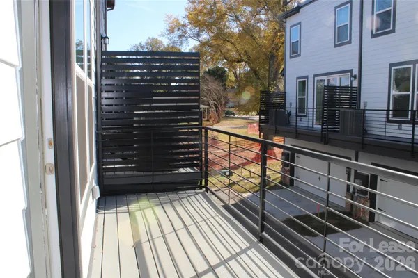 a front view of a building with many windows