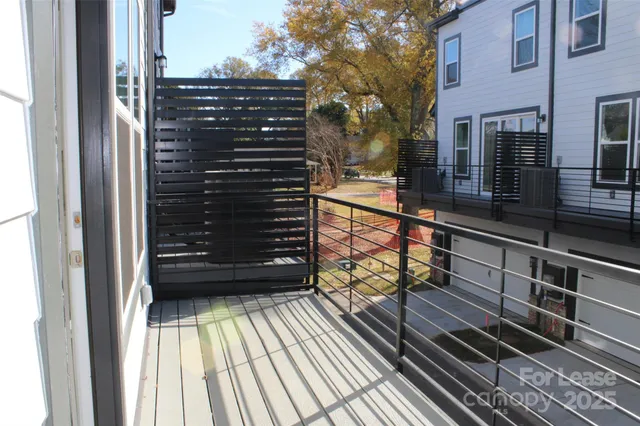 a front view of a building with many windows