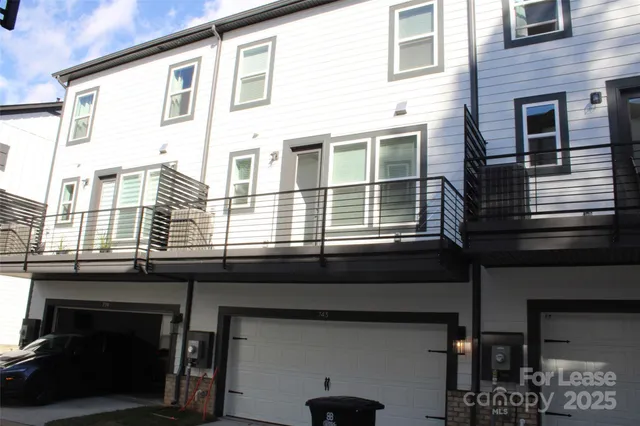 a front view of a building with glass windows