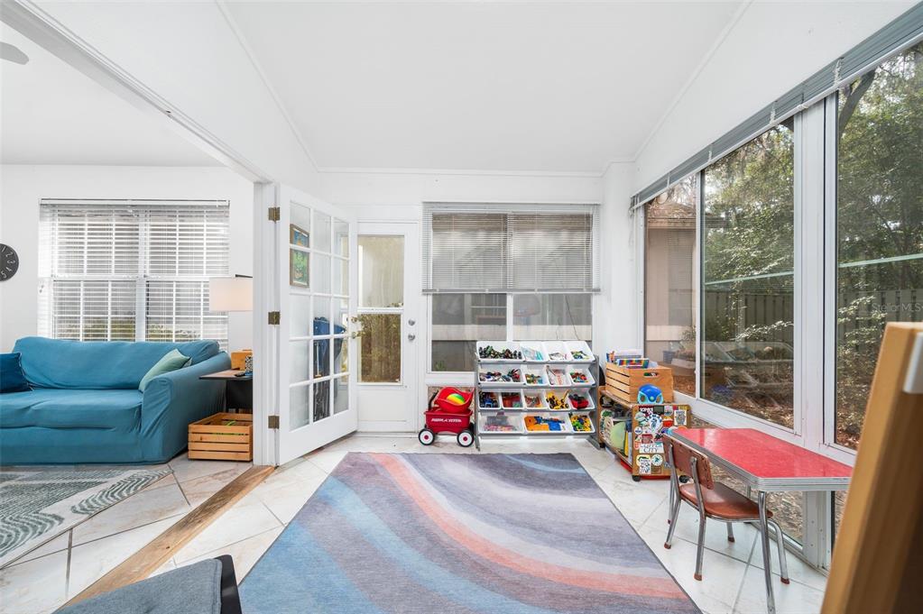 5154 Southwest 88 Terrace Gainesville, FL 32608 - Photo 16 of 29 a living room with furniture and a large window