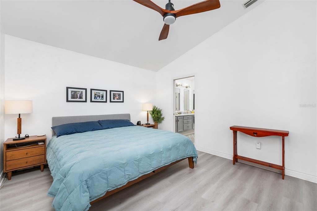5154 Southwest 88 Terrace Gainesville, FL 32608 - Photo 19 of 29 a bedroom with a bed and a dresser