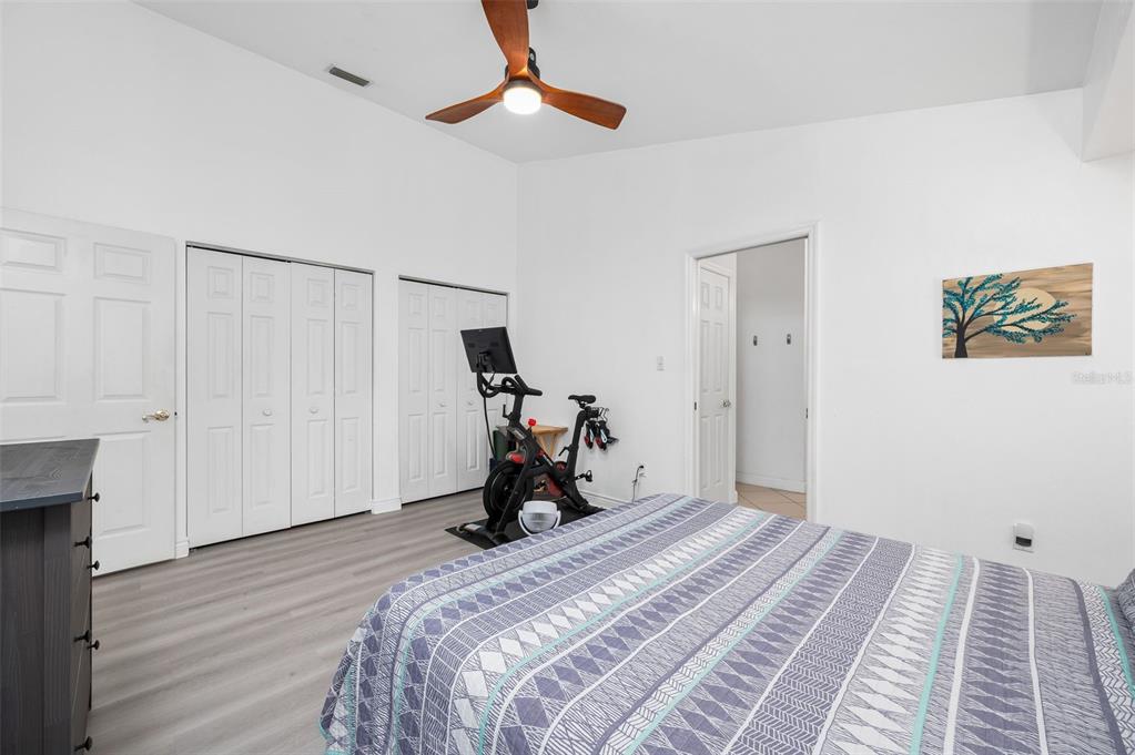 5154 Southwest 88 Terrace Gainesville, FL 32608 - Photo 22 of 29 a bed room with a bed and a window