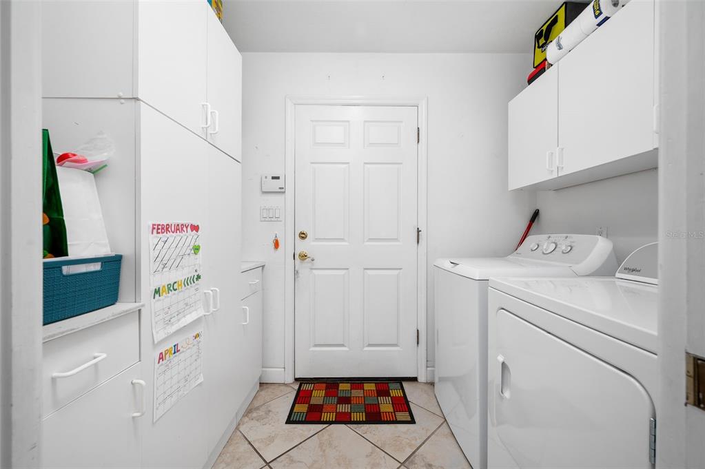 5154 Southwest 88 Terrace Gainesville, FL 32608 - Photo 27 of 29 a utility room with dryer and washer