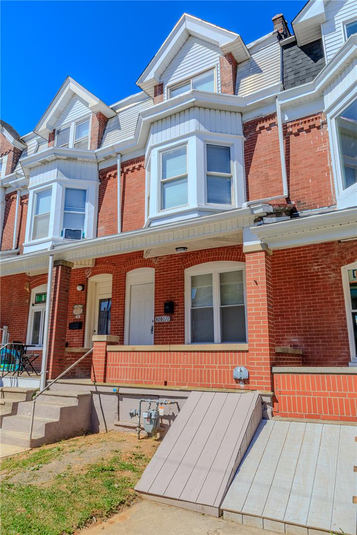 820 North 5th Street Allentown, PA 18102 - Photo 8 of 39 A charming brick row home with bay windows and traditional dormers defines curb appeal.