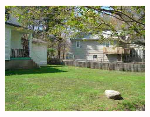 81 Lockwood Road Riverside, CT 06878 - Photo 3 of 5 a house view with a garden space