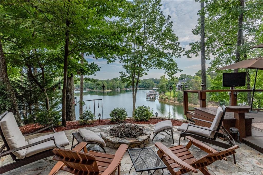 10023 Bora Bora Drive Tega Cay, SC 29708 - Photo 1 of 32 a view of outdoor space yard patio and swimming pool