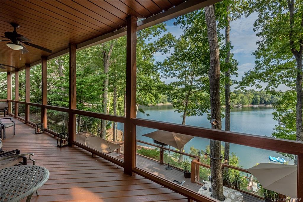 10023 Bora Bora Drive Tega Cay, SC 29708 - Photo 2 of 32 a view of a balcony with wooden floor