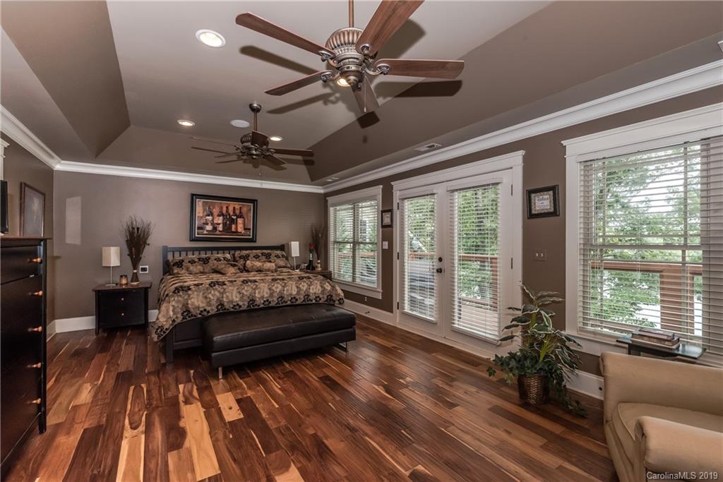 10023 Bora Bora Drive Tega Cay, SC 29708 - Photo 14 of 32 a living room with furniture and a large window