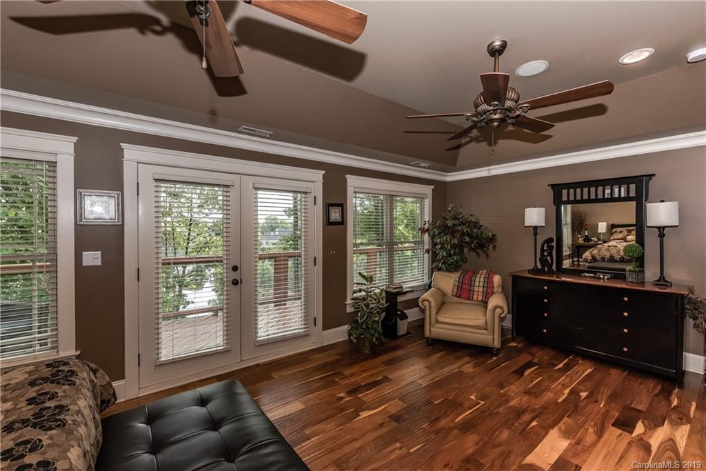 10023 Bora Bora Drive Tega Cay, SC 29708 - Photo 15 of 32 a living room with furniture and a window