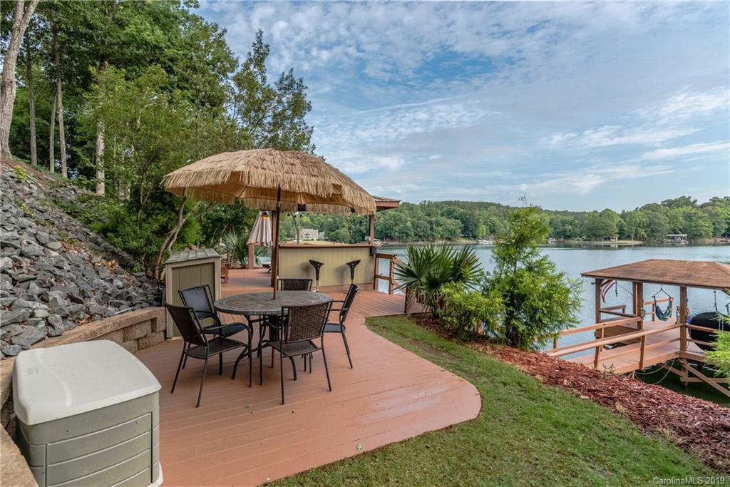 10023 Bora Bora Drive Tega Cay, SC 29708 - Photo 3 of 32 a view of a house with backyard and sitting area