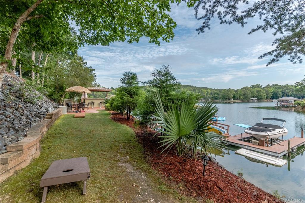 10023 Bora Bora Drive Tega Cay, SC 29708 - Photo 28 of 32 a garden view with a lake view