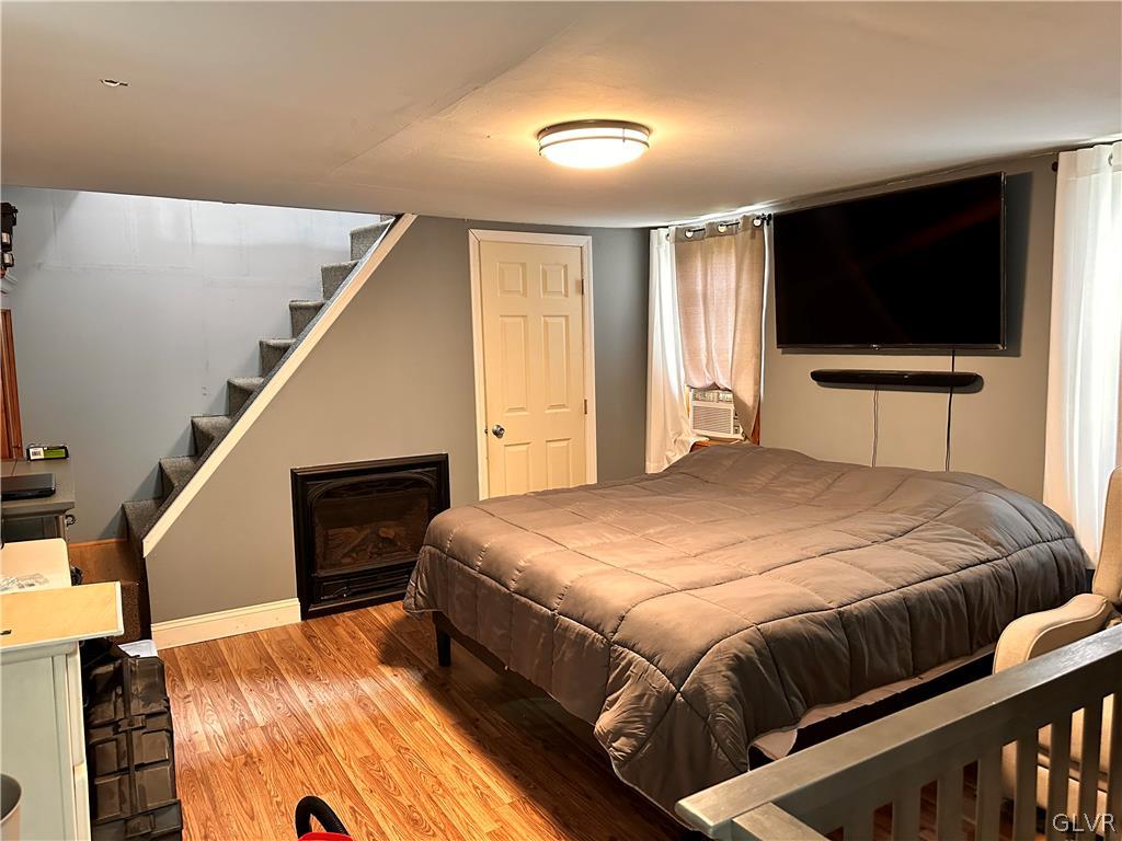 8547 Deer Road Slatington, PA 18080 - Photo 12 of 32 a bedroom with a bed and a flat screen tv