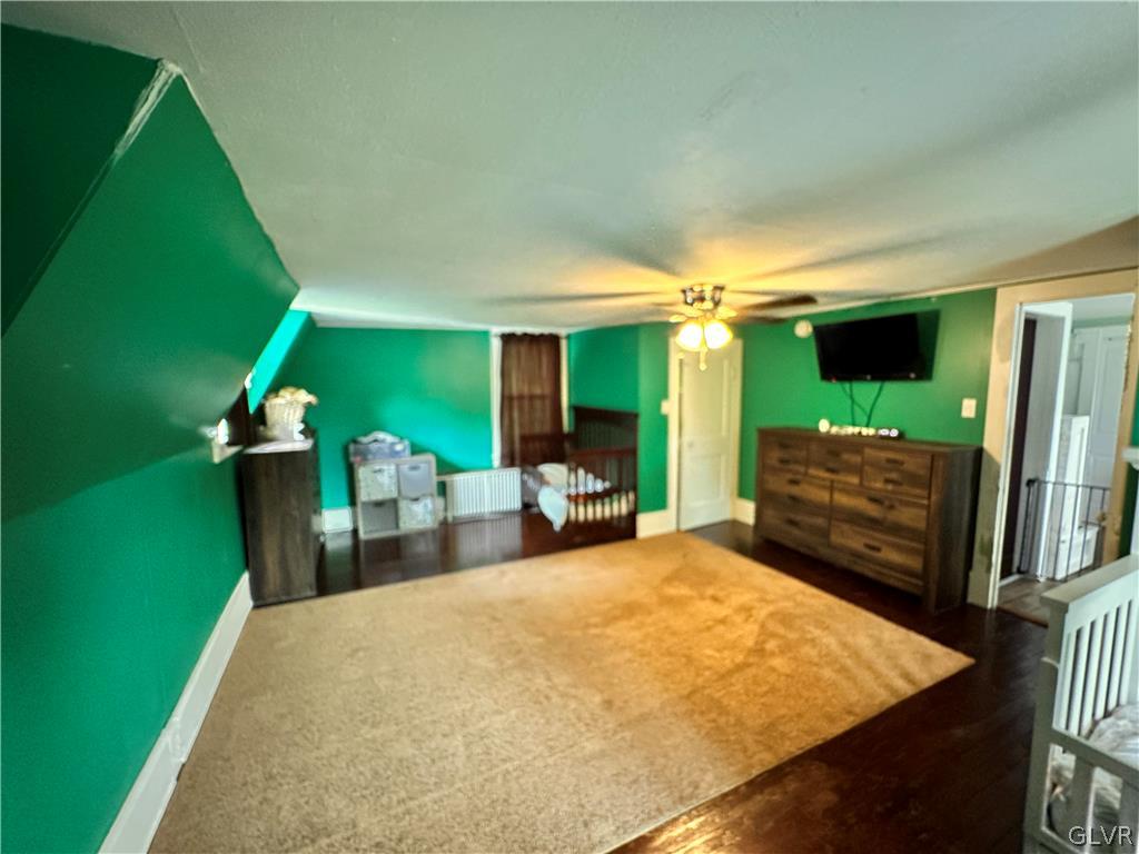 8547 Deer Road Slatington, PA 18080 - Photo 18 of 32 a bed room with a bed and mirror